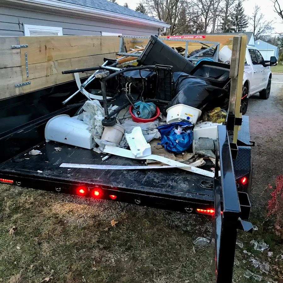 Roll-off dumpster delivered to a residential driveway in Comanche